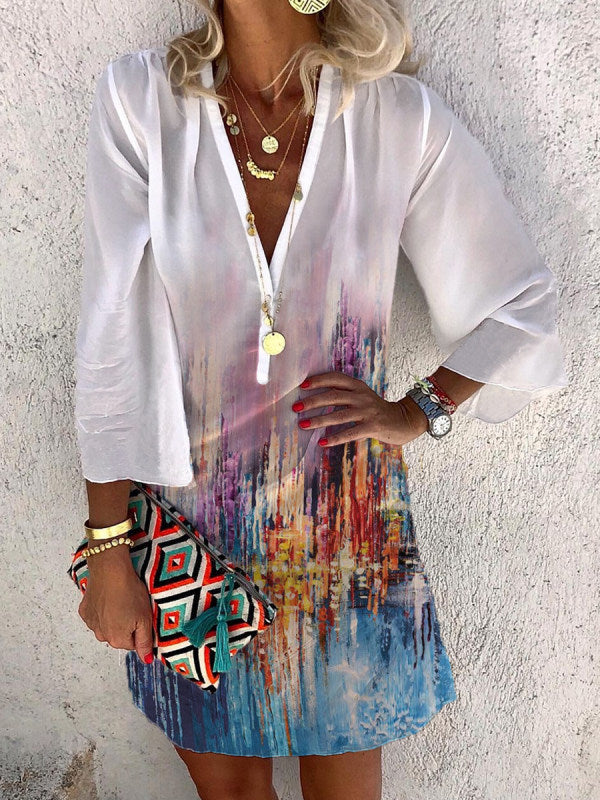 White printed mini dress with V-neck, button-front, long sleeves and colorful hem