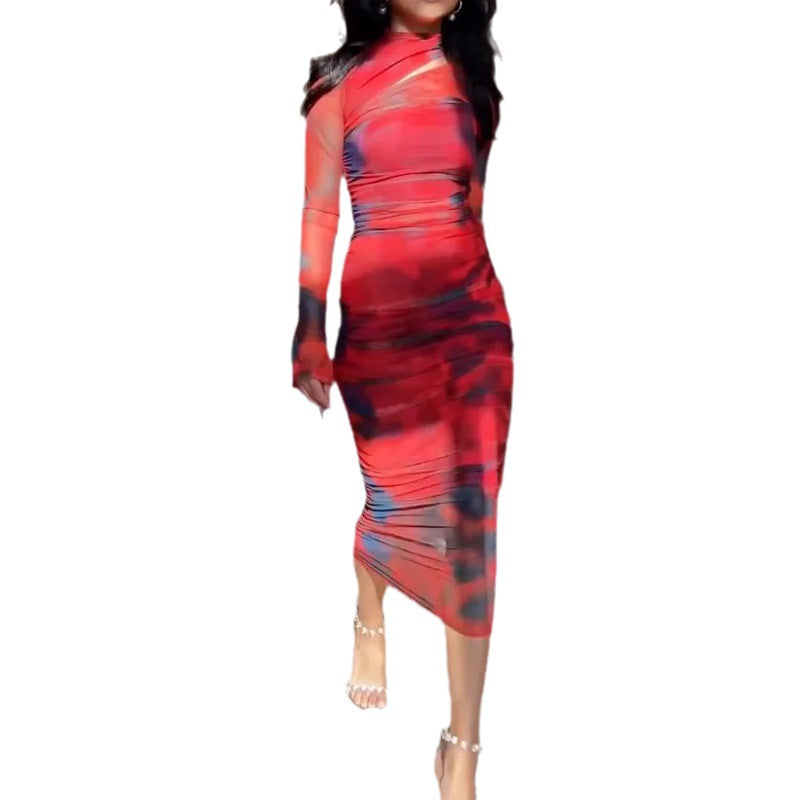 Red, pink and blue abstract bodycon midi dress with long sleeves and high neck