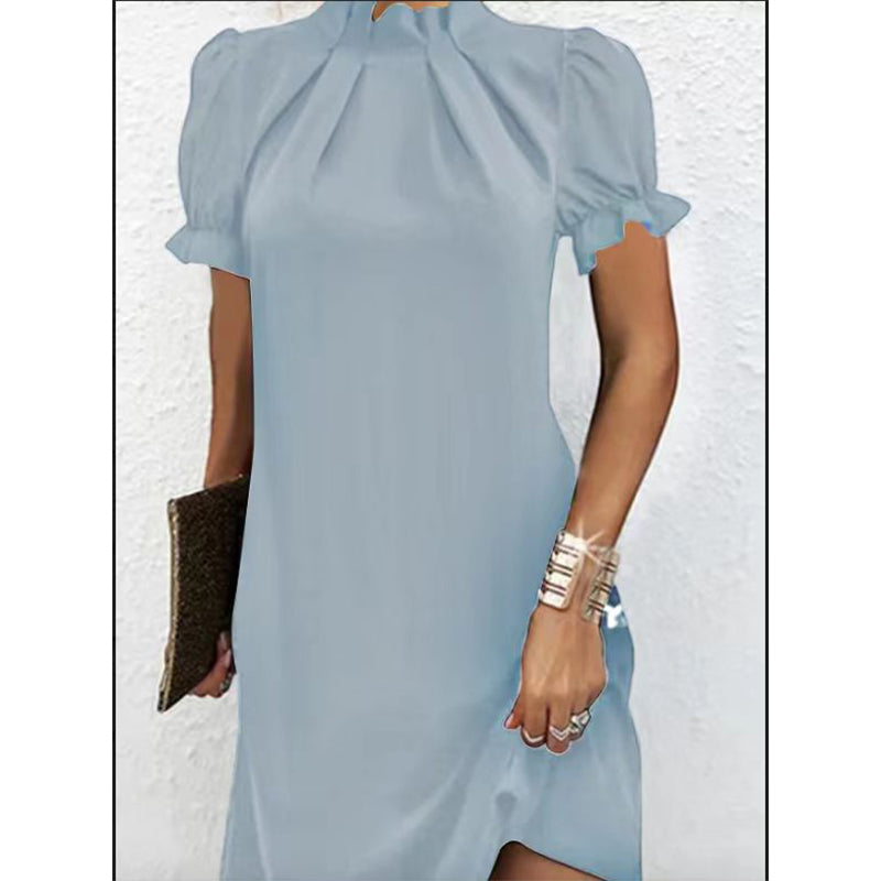 Light blue gathered-neck dress with short sleeves and smooth drape, above-knee length