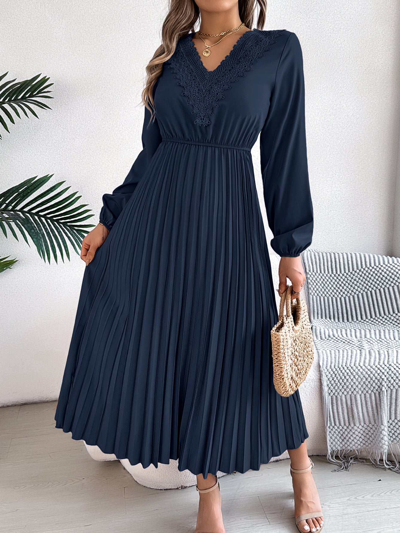 Pleated midi dress with long sleeves and lace-trim V-neck in navy blue, side view