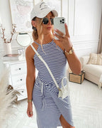 Sleeveless striped midi dress in navy and white, tied waist with side slit
