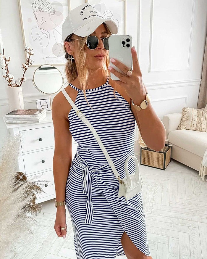 Sleeveless striped midi dress in navy and white, tied waist with side slit