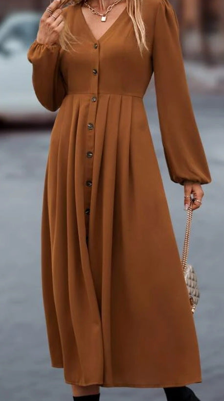 Brown midi dress detail: V-neckline, button front, and gathered waist skirt
