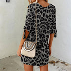 Leopard-print mini dress with round neck and loose three-quarter sleeves