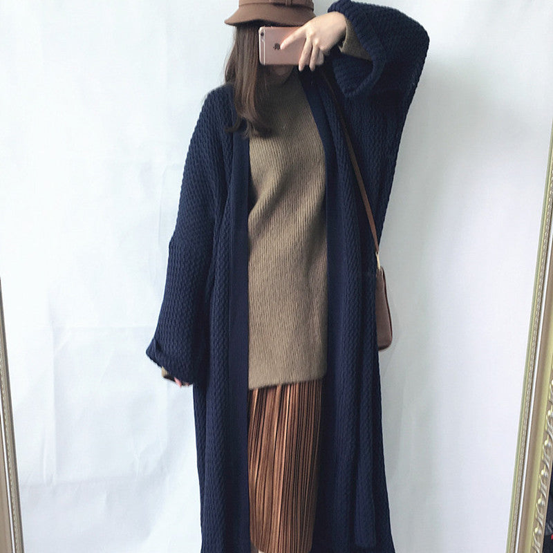 Navy textured knit cardigan with open front and oversized long sleeves