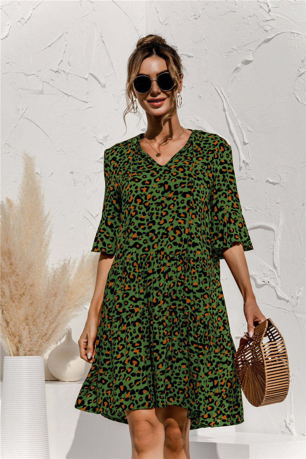 MONA summer dress in green leopard print, V-neck, short sleeves, tiered silhouette