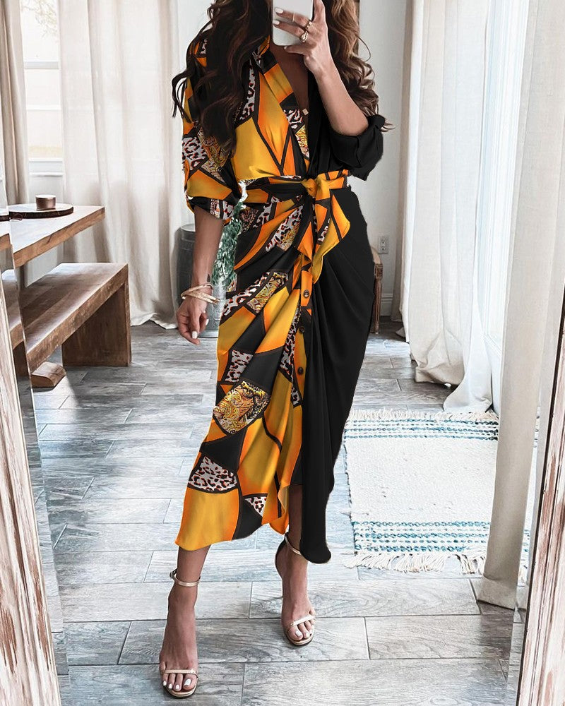 Wrap midi dress with waist tie, button front, black with orange patterned panels