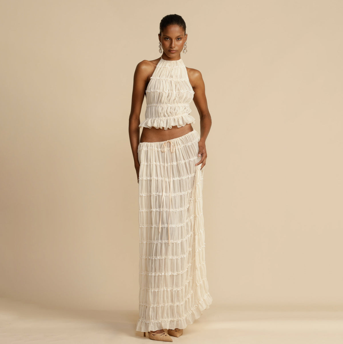White tiered ruffle halter top and tiered maxi skirt set, full length front