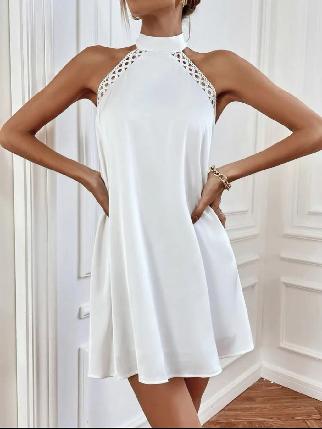 White halter mini dress with lace high neck and flared skater skirt