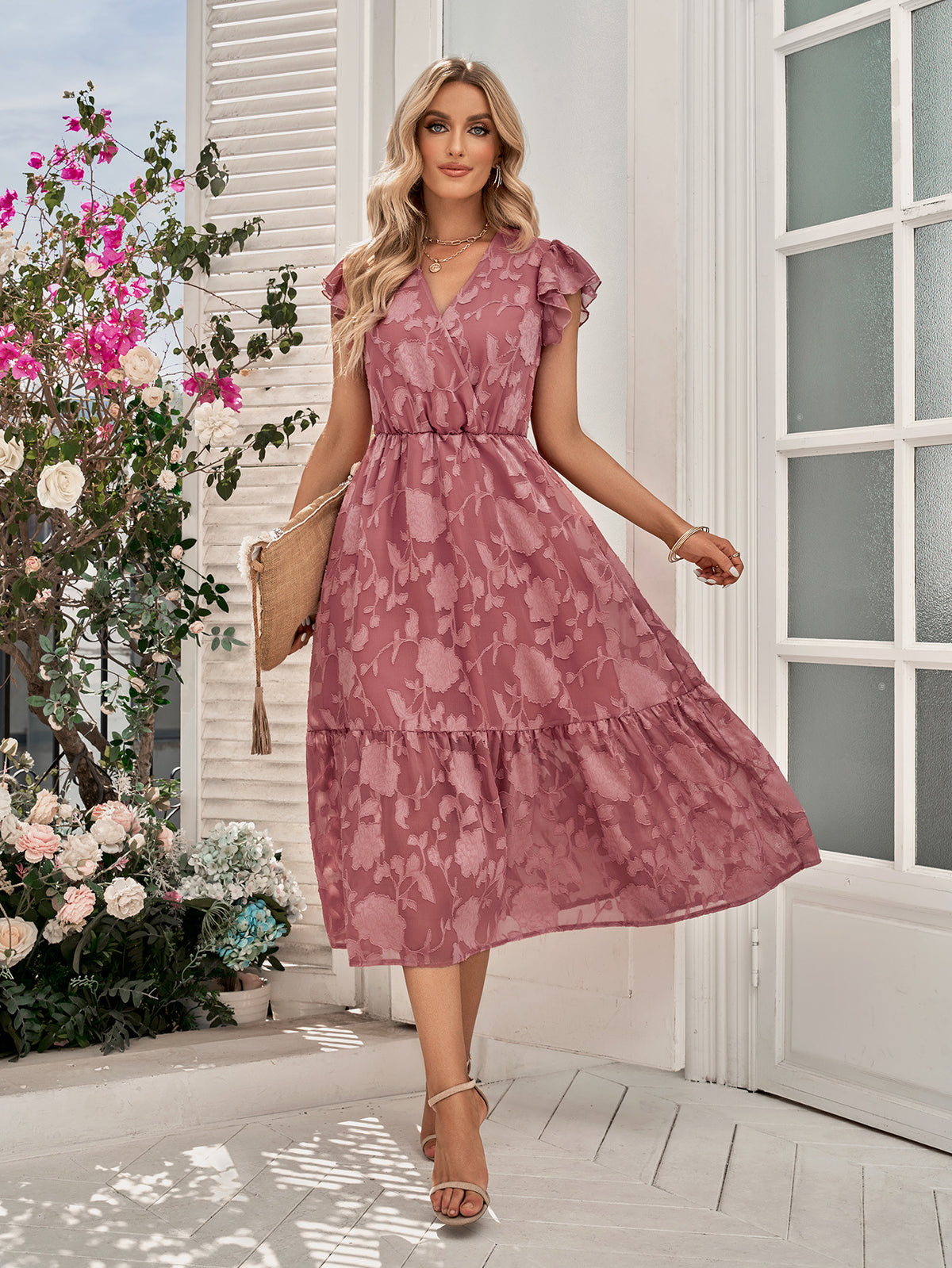 Pink V-neck midi dress with ruffled cap sleeves, gathered waist, tiered hem