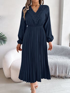 Pleated midi dress with long sleeves and lace-trim V-neck in navy blue, full front view