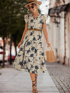 Cream floral tiered midi dress with V-neck, cap sleeves and braided waist belt