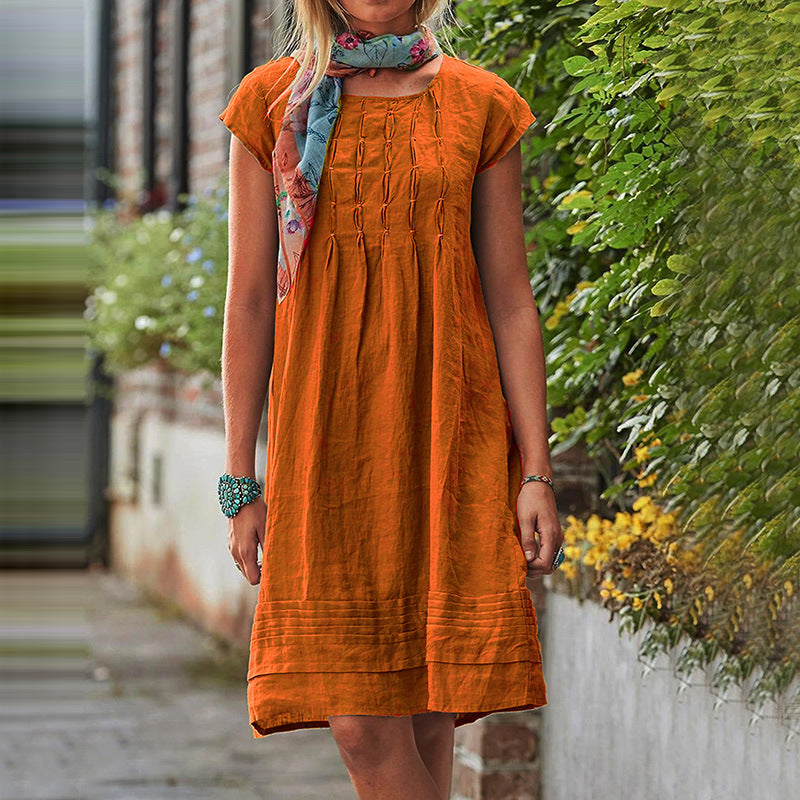Women's short-sleeve summer dress, orange tiered skirt with pintuck detail