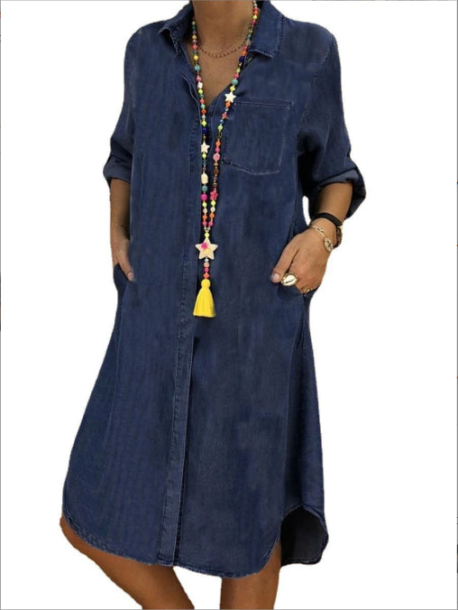 Navy denim shirt dress with front button placket, patch pocket, tassel necklace