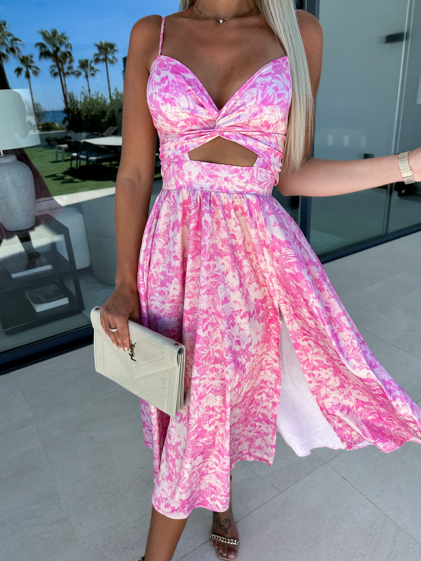Pink floral midi dress with spaghetti straps, V neckline, knot bust, flared skirt