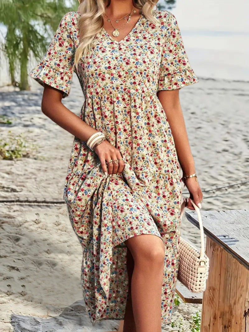 Floral V-neck midi dress in apricot with short puff sleeves and gathered waist