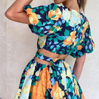 Floral casual summer dress with puff sleeves and tie waist, navy and yellow tones