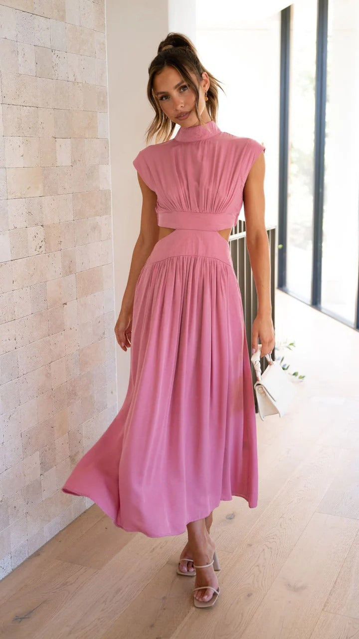 Pink sleeveless midi dress with high neck and gathered waist with flowing skirt