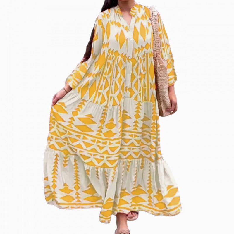 Women’s maxi dress with three-quarter sleeves, V-neck, yellow and white geometric pattern