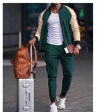 Men's DOLRIX track suit: green zip jacket with tan sleeves, jogger pants with tapered cuffs