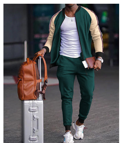 Men's DOLRIX track suit: green zip jacket with tan sleeves, jogger pants with tapered cuffs