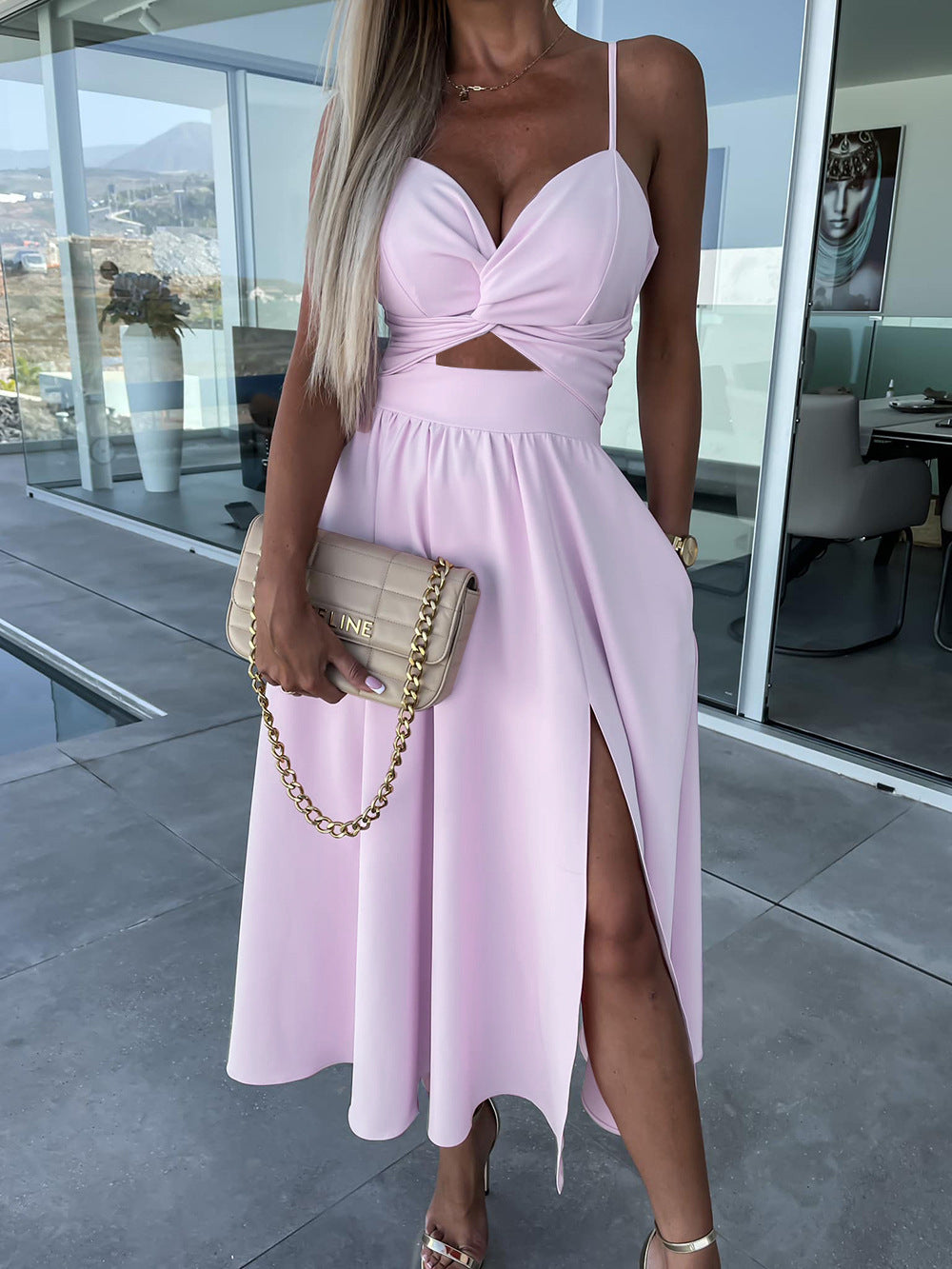 Lavender sleeveless midi dress with twisted bust, front waist cutout, and side slit