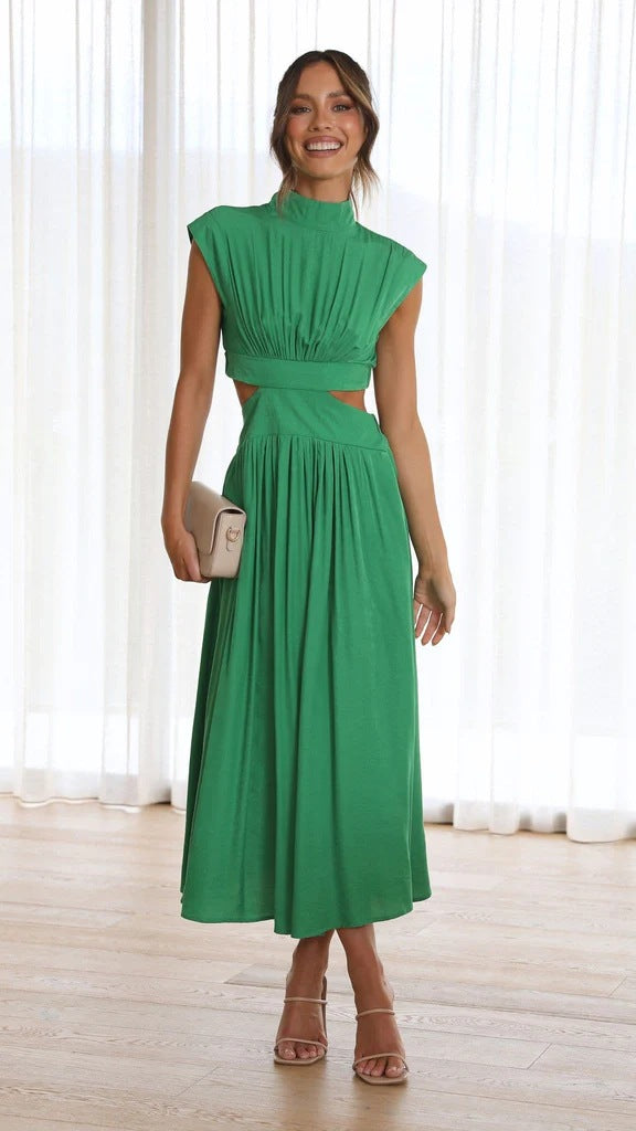 Green sleeveless midi dress with high neck and cinched waist detail