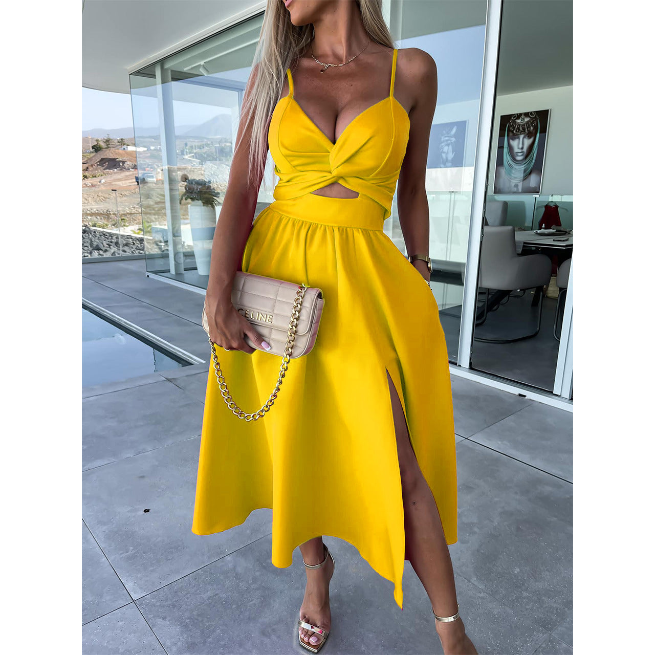 Stylish yellow midi dress with spaghetti straps, V-neck, knot waist detail, and side slit