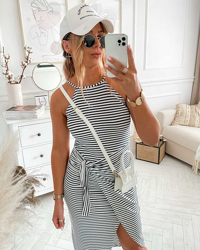 Sleeveless striped midi dress in navy and white with tied waist and side slit