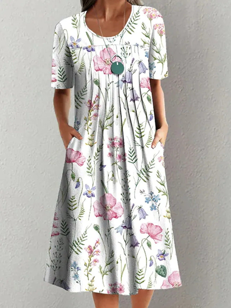 Casual floral dress in white with pastel floral print, short sleeves, and keyhole neckline