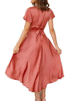 Coral V-neck summer dress with flutter sleeves and ruched waist tie, asymmetrical hem
