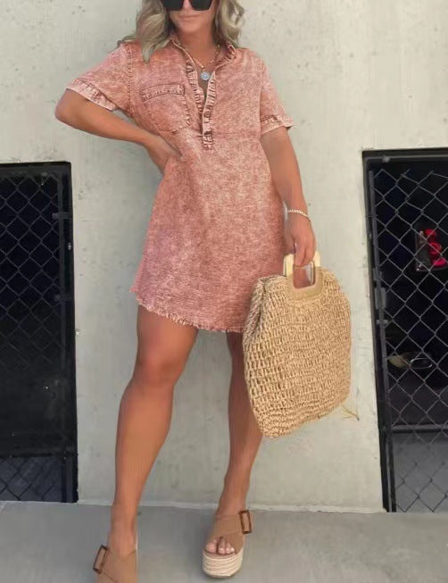 Coral-pink denim-style casual dress with button placket, short sleeves, and frayed hem
