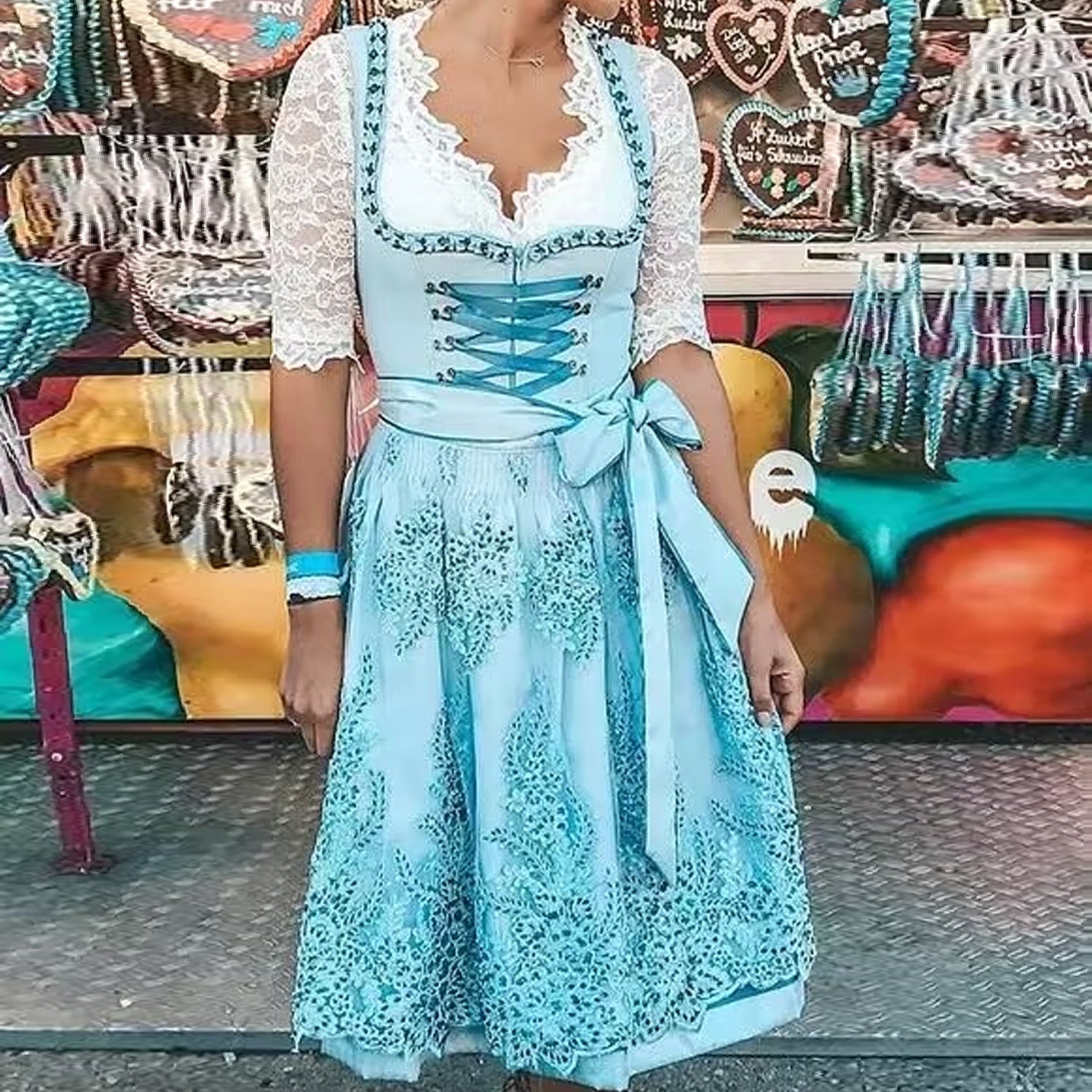 Turquoise midi dress with lace corset bodice, front lacing, and wide lace skirt
