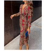 Red and tan patterned summer dress with V-neck wrap, gathered waist tie, long sleeves