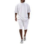 White relaxed summer set: short-sleeve T-shirt and knee-length shorts