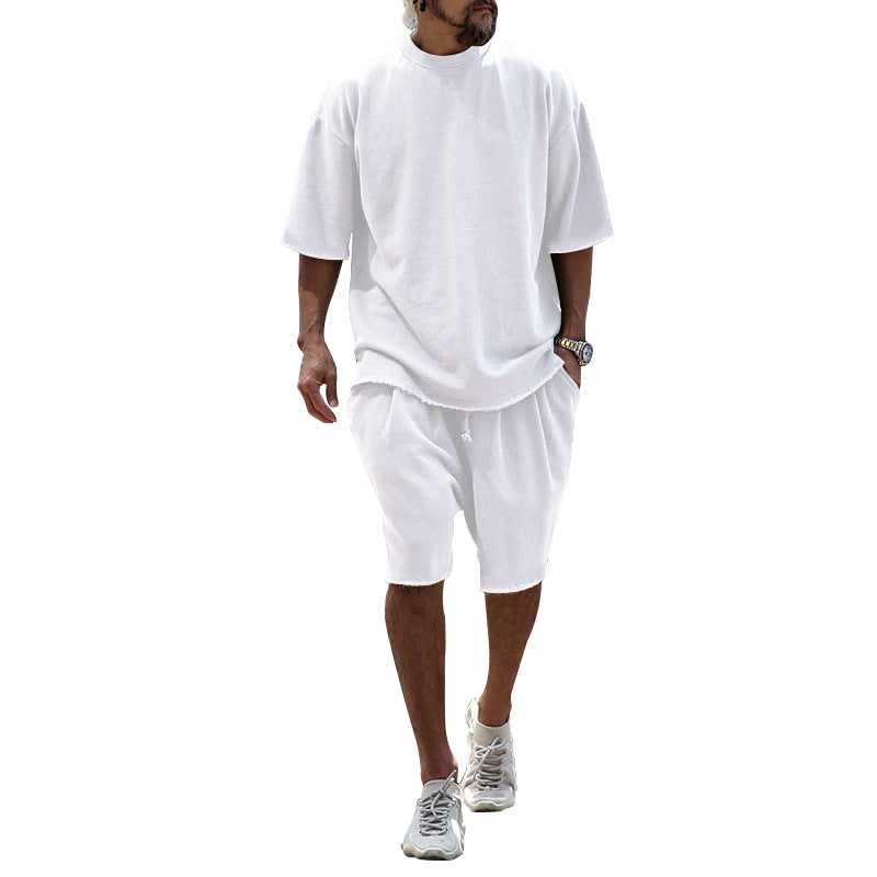 White relaxed summer set: short-sleeve T-shirt and knee-length shorts