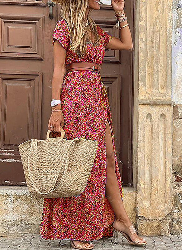 Boho maxi dress in red and pink floral pattern with short sleeves and side slit