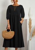 WEGAHTA long dress in black with gathered waist and 3/4 puff sleeves