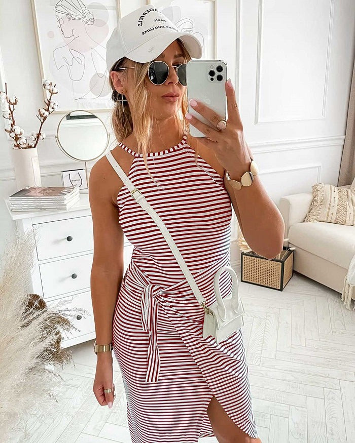 Sleeveless striped midi dress in red and white with tied waist and side slit