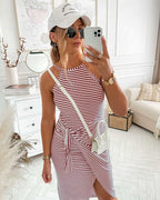 Sleeveless striped midi dress in red and white with tied waist and side slit