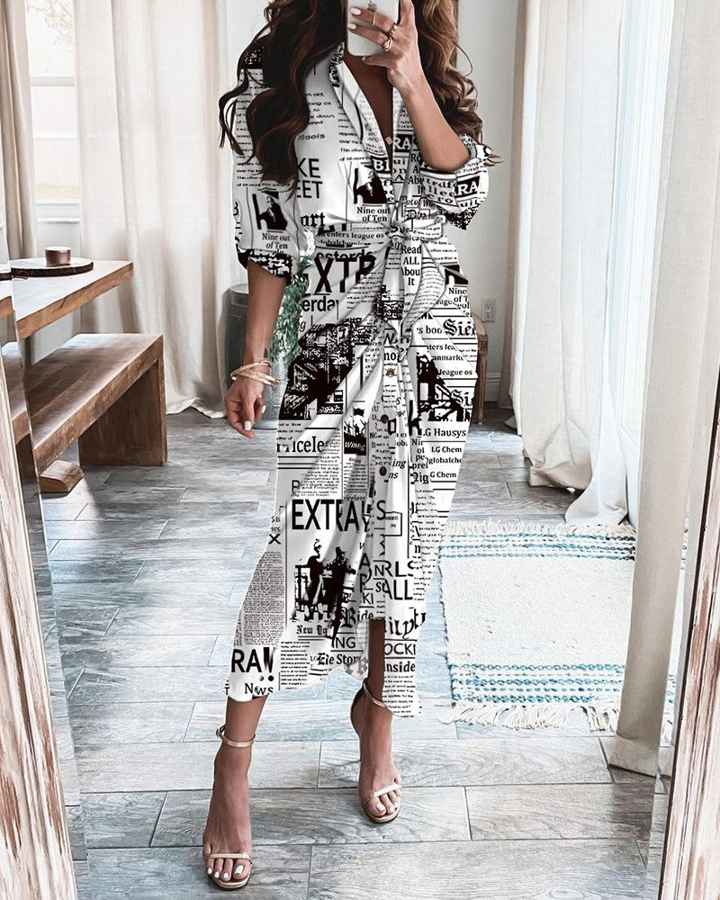 Wrap midi dress with waist tie, button front, white newspaper-style text print