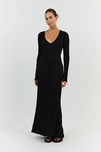 Black V-neck midi dress front view with long sleeves and ribbed fabric