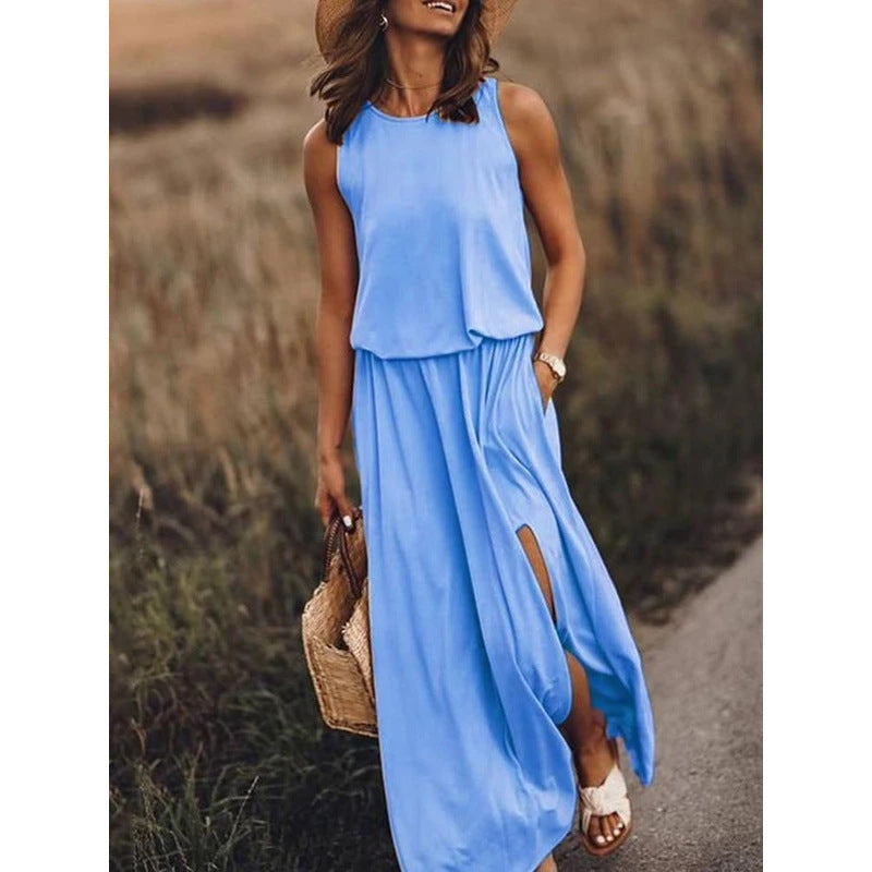 Sleeveless summer dress, light blue draped tiered top with flowing skirt and side slit