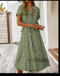 Green printed V-neck midi dress with short sleeves and gathered waist