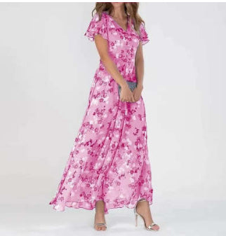 Pink floral midi dress with ruffled cap sleeves and V-neck, tiered skirt