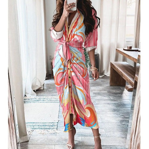 Wrap midi dress with waist tie, button front, pink and multicolor abstract print