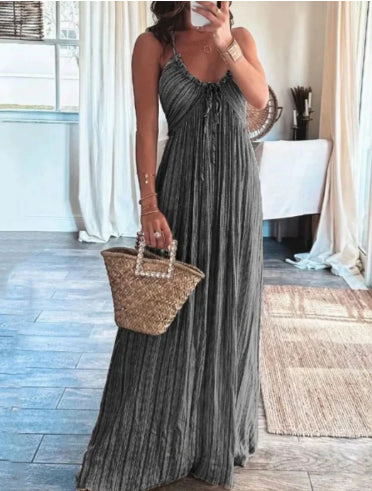 Black striped maxi dress with spaghetti straps and tassel neckline