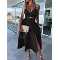 Stylish black midi dress with spaghetti straps, V-neck, cutout waist, and front slit