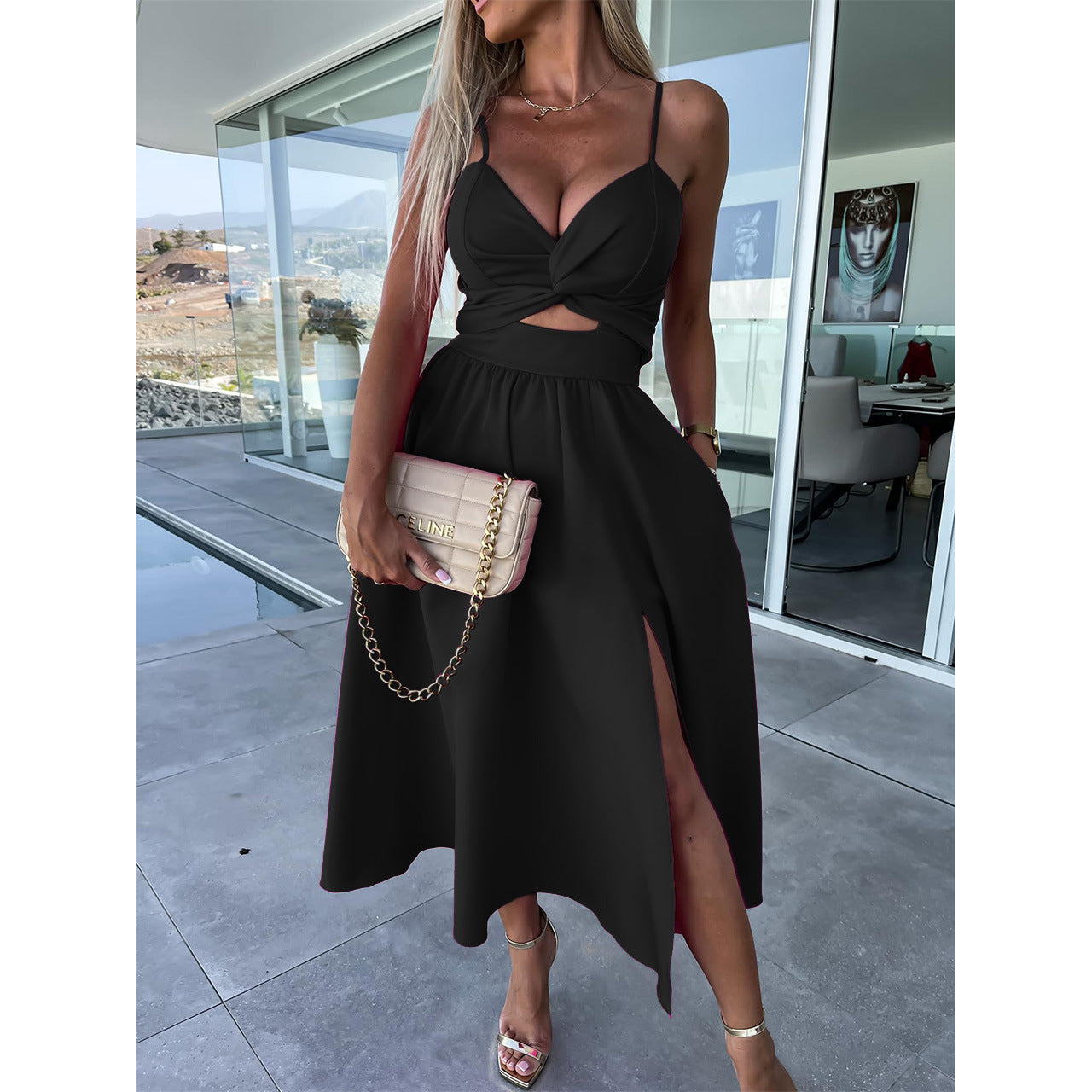 Stylish black midi dress with spaghetti straps, V-neck, cutout waist, and front slit