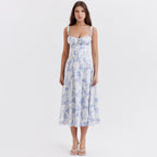 Elegant midi dress in light blue with floral print and ruched sweetheart neckline